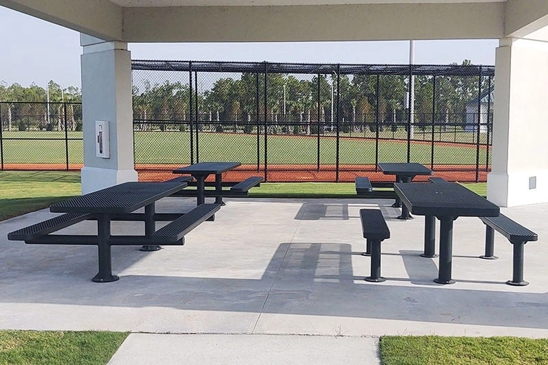 Durable vandal-resistant metal picnic table with expanded mesh design for airflow and drainage